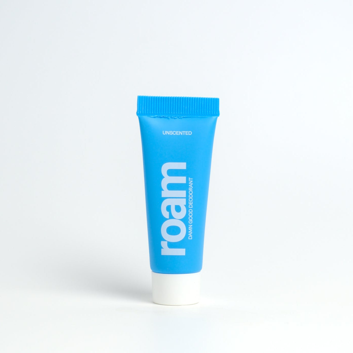 tube of unscented roam deodorant in blue on a white background